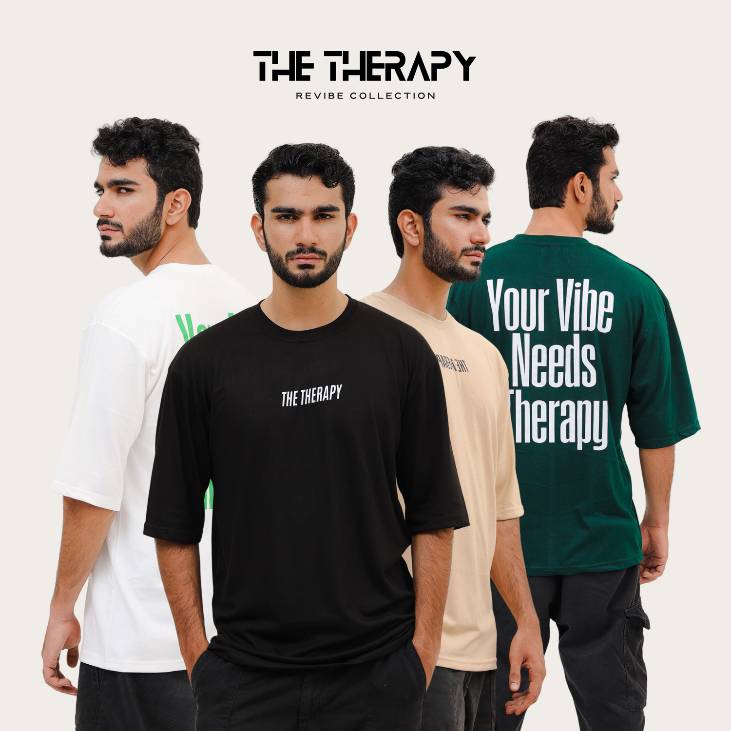 Models wearing The Therapy Revibe Collection oversized unisex t-shirts in bottle green, black, beige, and white, minimal streetwear style with statement back prints.